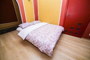 Cama o camas de una habitación en Vip Arenda Minsk