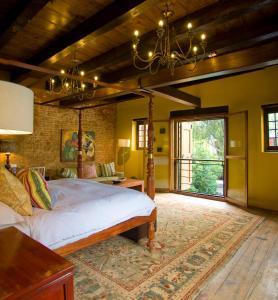 Katil atau katil-katil dalam bilik di Cape Heritage Hotel
