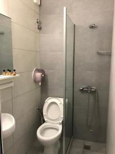 A bathroom at Lena Hotel