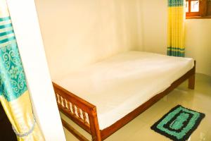 Letto o letti in una camera di Thuruliya Residence