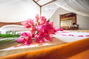 Ein Bett oder Betten in einem Zimmer der Unterkunft Hotel Yapahuwa Paradise