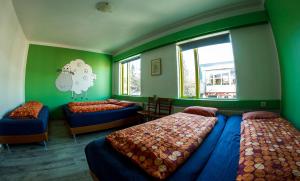 Ένα ή περισσότερα κρεβάτια σε δωμάτιο στο Selfoss Hostel