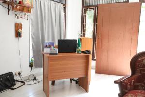TV o dispositivi per l'intrattenimento presso Tony's Garden House Back Packers inn
