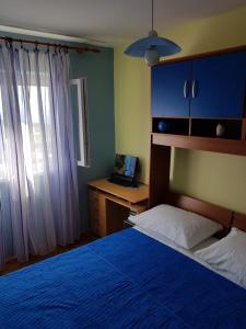 Giường trong phòng chung tại Apartment Jakov