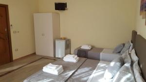 Cama ou camas em um quarto em Salento Al Mare