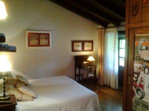 Cama o camas de una habitación en Hotel Rural Natxiondo