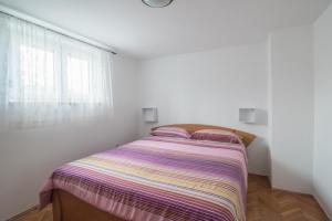 Postel nebo postele na pokoji v ubytování Apartment Lavanda