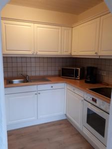 Kuchyň nebo kuchyňský kout v ubytování Ferienwohnung Gashi