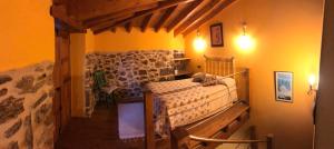 Cama o camas de una habitación en Apartamentos Rurales A Torre