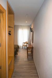 Postel nebo postele na pokoji v ubytování Hotel Simancas