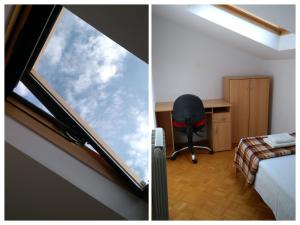 a room with a window with a desk and a chair at Apartma Ivan in Portorož
