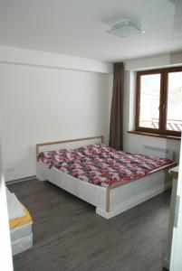 Posteľ alebo postele v izbe v ubytovaní Panorama Donovaly 35A