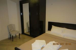 Łóżko lub łóżka w pokoju w obiekcie Luxury Villa Nieli