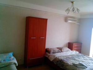 Voodi või voodid majutusasutuse Homelike flat near the IEC on Levoberezhnaya toas