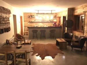 Posezení v ubytování Hotel 381 Panguipulli