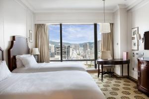 Ένα ή περισσότερα κρεβάτια σε δωμάτιο στο The Langham, Shenzhen
