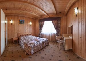 En eller flere senge i et værelse på Solnce Karpat