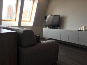 Svetainės erdvė apgyvendinimo įstaigoje Sikorska Apartamenty