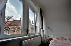 A bed or beds in a room at Best View Apartments