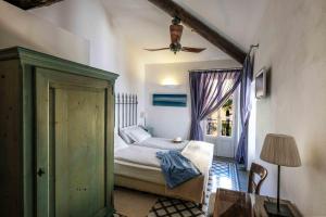 Кровать или кровати в номере Albergo Milano