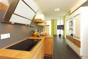 a kitchen with a sink and a counter top at Lotsenstieg 04 in Ostseebad Karlshagen