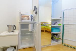 Ein Bett oder Betten in einem Zimmer der Unterkunft Private rooms next to subway