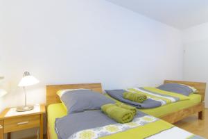 Ein Bett oder Betten in einem Zimmer der Unterkunft Private rooms next to subway