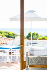 Balkón alebo terasa v ubytovaní Marpunta Resort, Santikos Collection