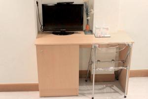 TV a/nebo společenská místnost v ubytování Pensión Basic Confort
