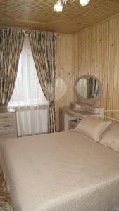 Posteľ alebo postele v izbe v ubytovaní Marmarosy