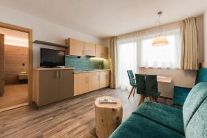 Kuchyň nebo kuchyňský kout v ubytování Hotel & Residence Rebhof