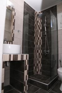 Koupelna v ubytování R&K Suites