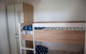 Postel nebo postele na pokoji v ubytování Apartman Petar