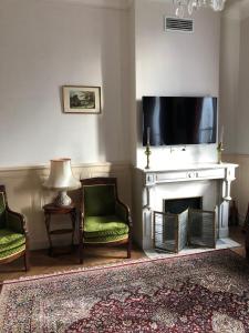 TV/trung tâm giải trí tại La Villa du Château Belloy
