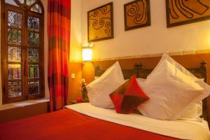 Katil atau katil-katil dalam bilik di Riad Sable Chaud