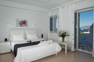Postel nebo postele na pokoji v ubytování Zannis Hotel