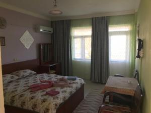 Postel nebo postele na pokoji v ubytování Hotel Grün