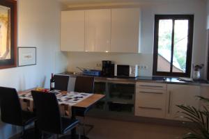 Kuchyň nebo kuchyňský kout v ubytování Kallista 2