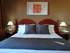 Cama o camas de una habitación en Hotel Ayamonte Center