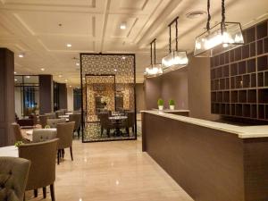 Posezení v ubytování Rivoli Hotel Jakarta