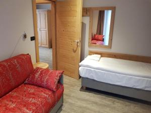 Katil atau katil-katil dalam bilik di Hotel Garni My Ledro