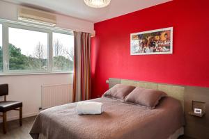 Postel nebo postele na pokoji v ubytování Hotel Biarritz Atlantique - Lycée Hotelier - Management School