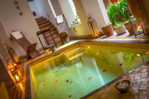 an overhead view of a swimming pool in a house at Riad Sable Chaud in Marrakesh