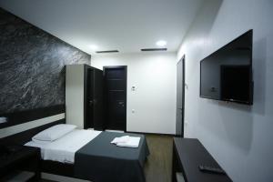 Katil atau katil-katil dalam bilik di West Tower Hotel