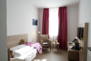 Postel nebo postele na pokoji v ubytování Hotel Edel Weiss