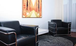 Posezení v ubytování Hotel Herencia By Hosting House