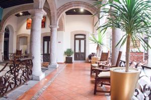 Posezení v ubytování Hotel Herencia By Hosting House