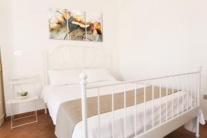 Postel nebo postele na pokoji v ubytování Casetta Canale delle Donne