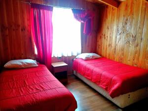 Postel nebo postele na pokoji v ubytování Hotel Catripulli