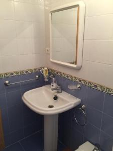 Koupelna v ubytování Apartamento con piscina en Torremolinos